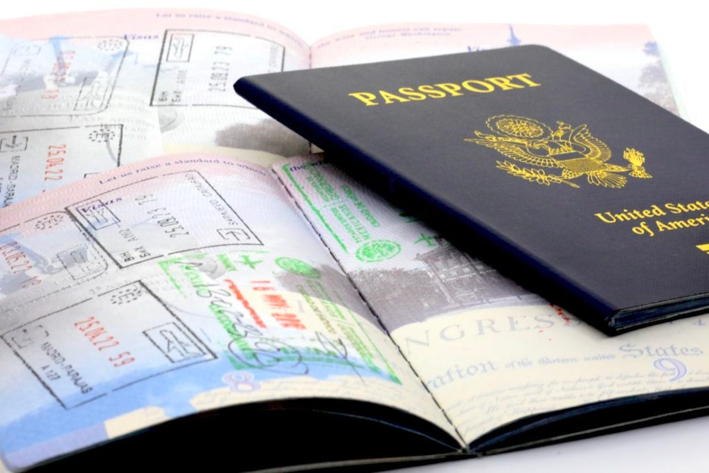 Travelers passport and international entry stamps