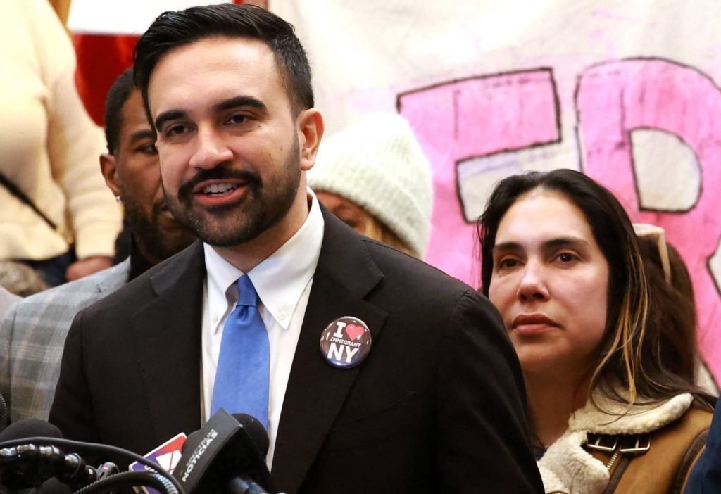 New York City high school student Dylan Contreras attends a news conference in New York