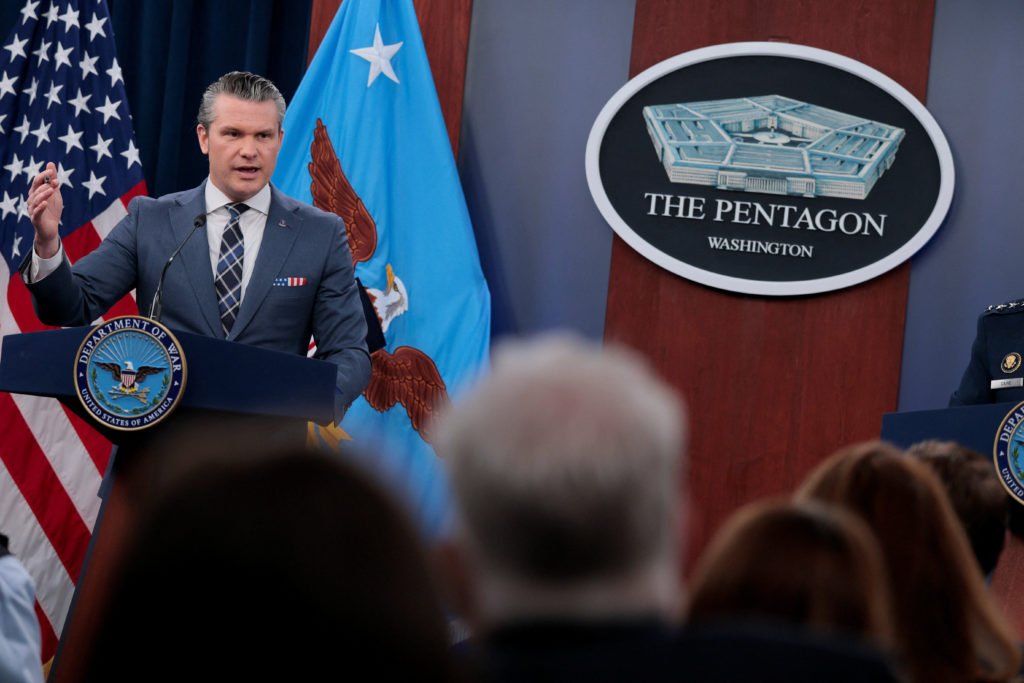 U.S. Secretary of Defense Pete Hegseth and Chairman of the Joint Chiefs of Staff General Dan Caine hold a briefing amid th...