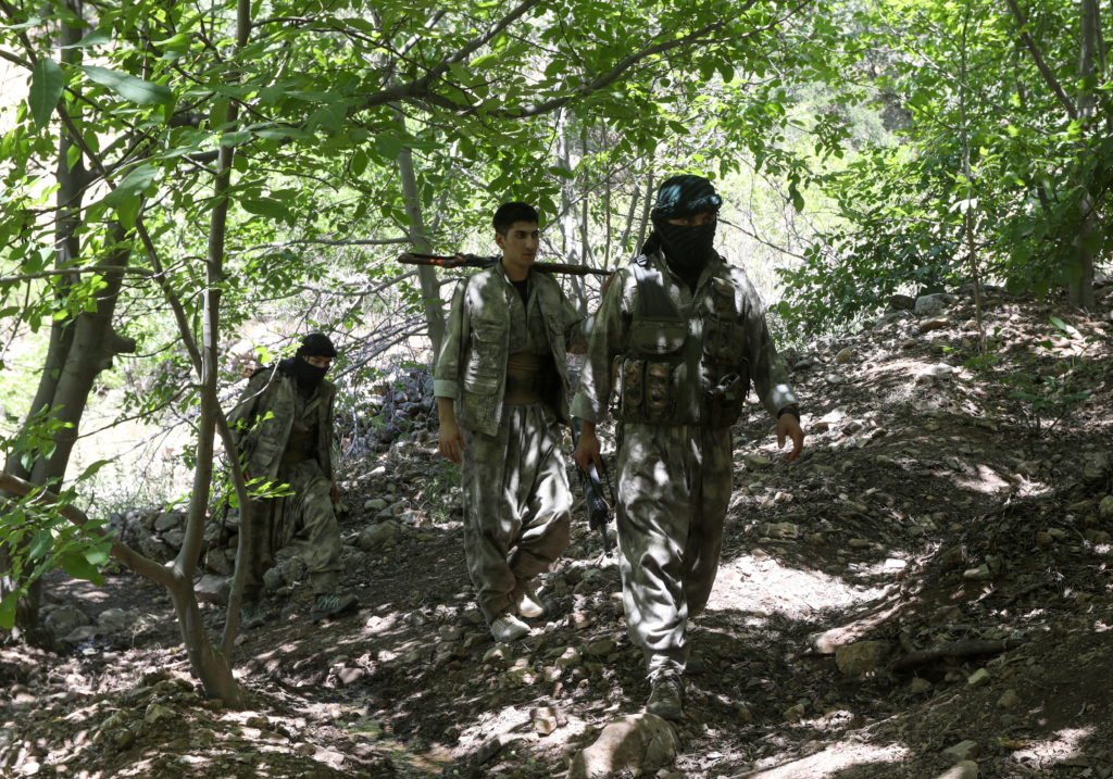 Fighters from the Kurdistan Free Life Party (PJAK), an Iranian Kurdish opposition group, are pictured near the border with...