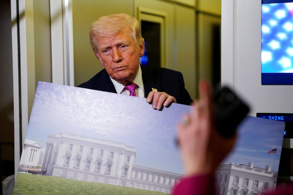 U.S. President Donald Trump on board Air Force One for travel to Joint Base Andrews