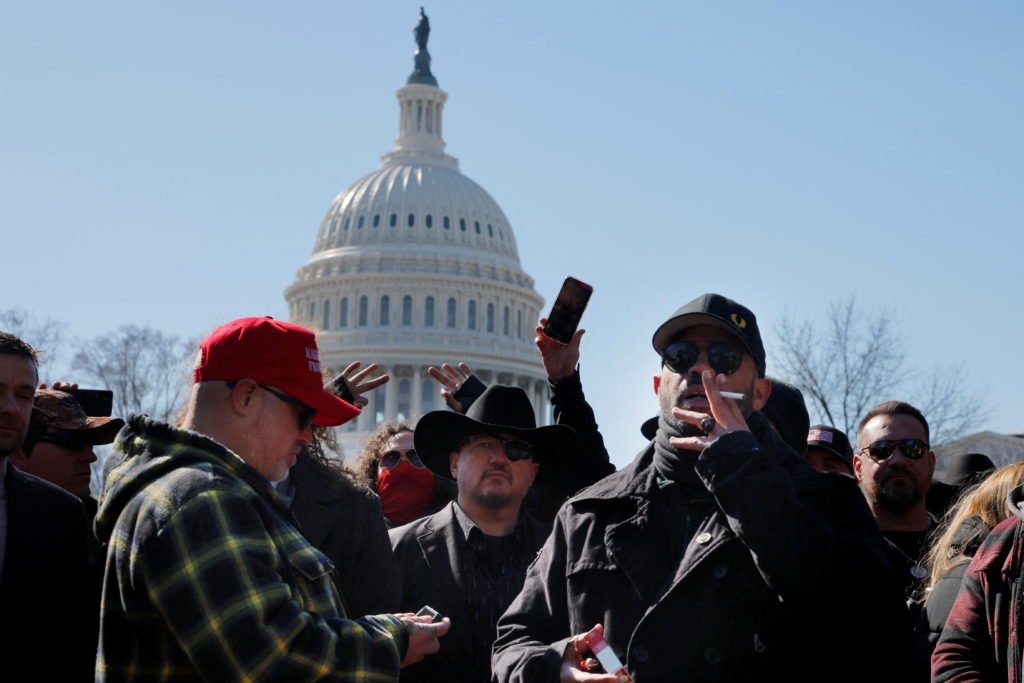 Former Proud Boys and Oath Keeper leaders hold a press availability in Washington