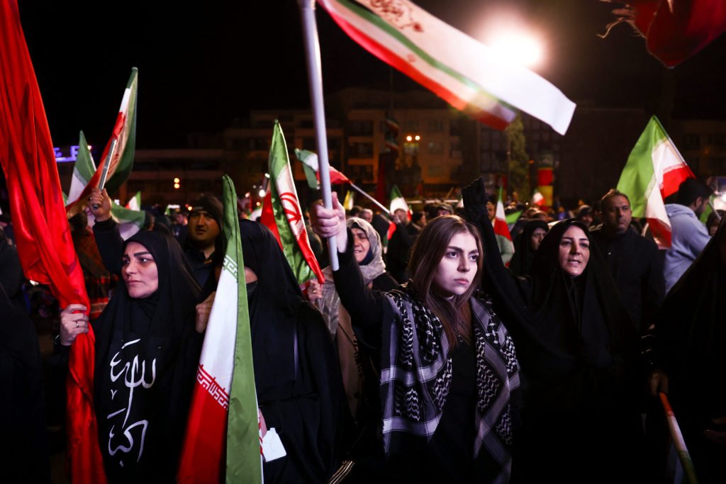 People gather after a two-week ceasefire in the Iran war was announced, in Tehran