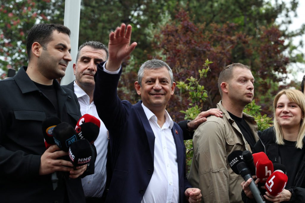 Outsed CHP chairman Ozel greets his supporters as they gather near the parlaiment in Ankara