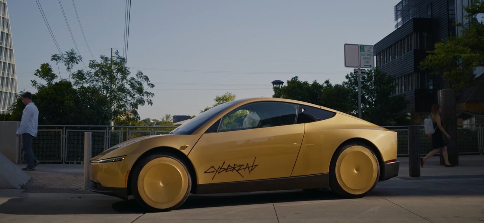 Tesla’s Cybercab reveal: driverless gold glitz and electric braking